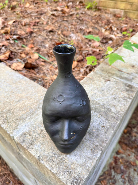 Moon face vase