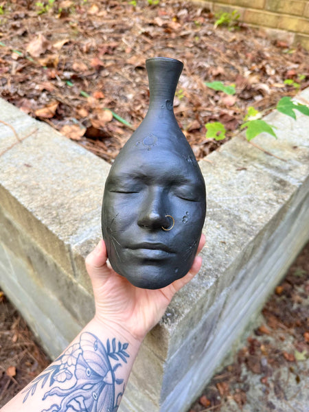 Moon face vase