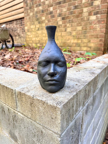 Moon face vase
